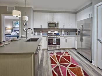 Fully furnished kitchen with stainless steel appliances